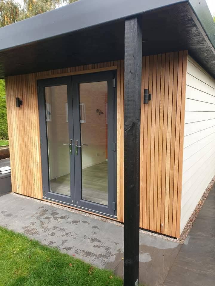 Green Room Gardens - garden room with cedar cladding and grey door